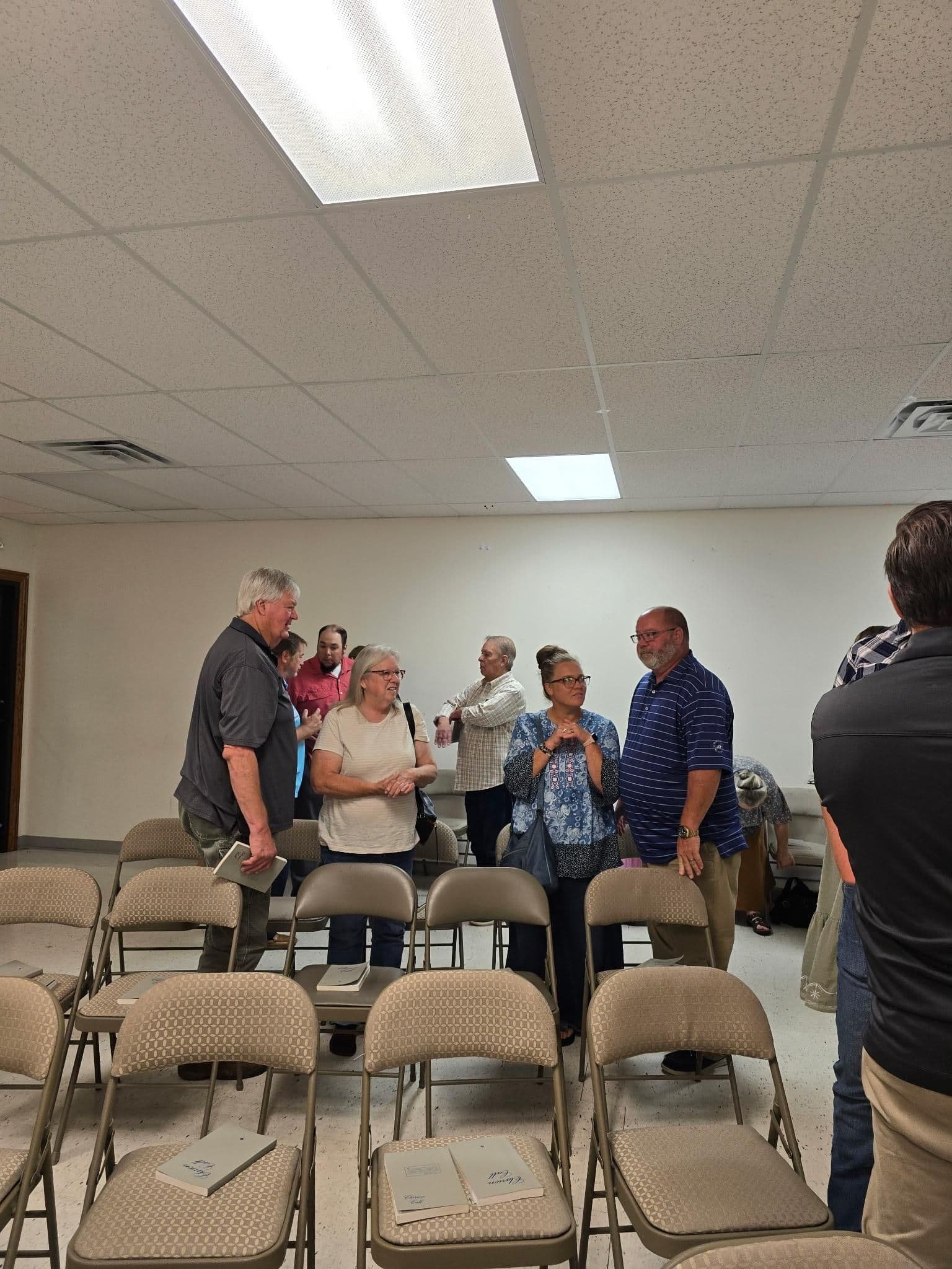 Members of the Cassville congregation visiting after worship